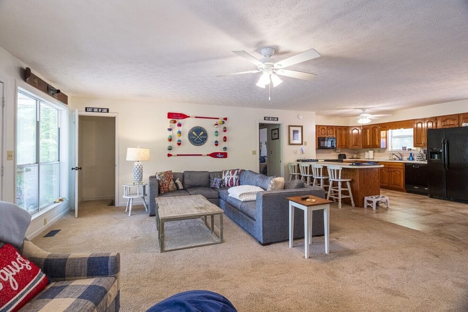 Living Room | Coffee Table & Lounge Seating | Breakfast Bar & Connected Kitchen