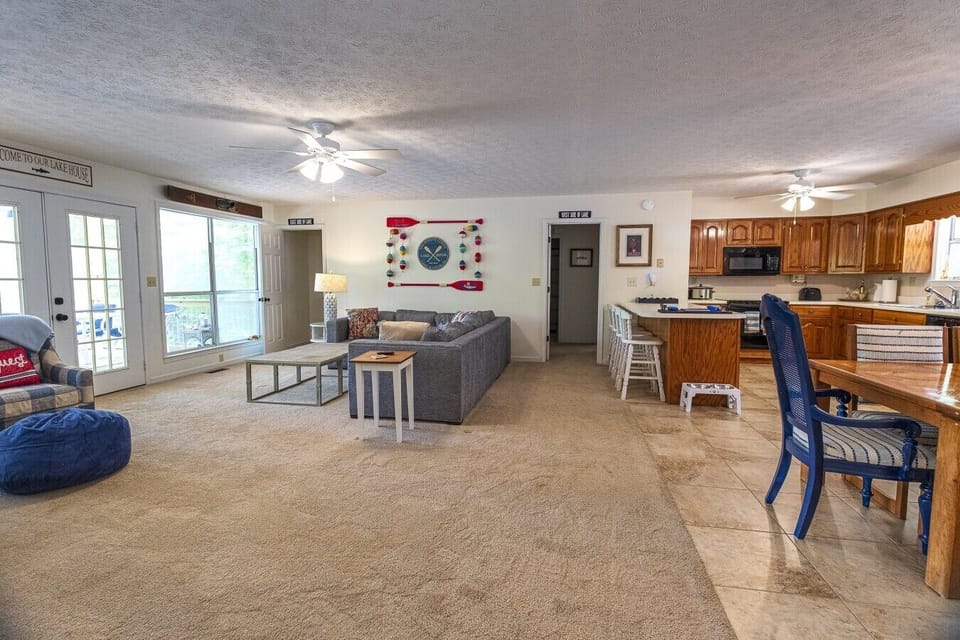 Living Room | Coffee Table & Lounge Seating | Breakfast Bar & Connected Kitchen