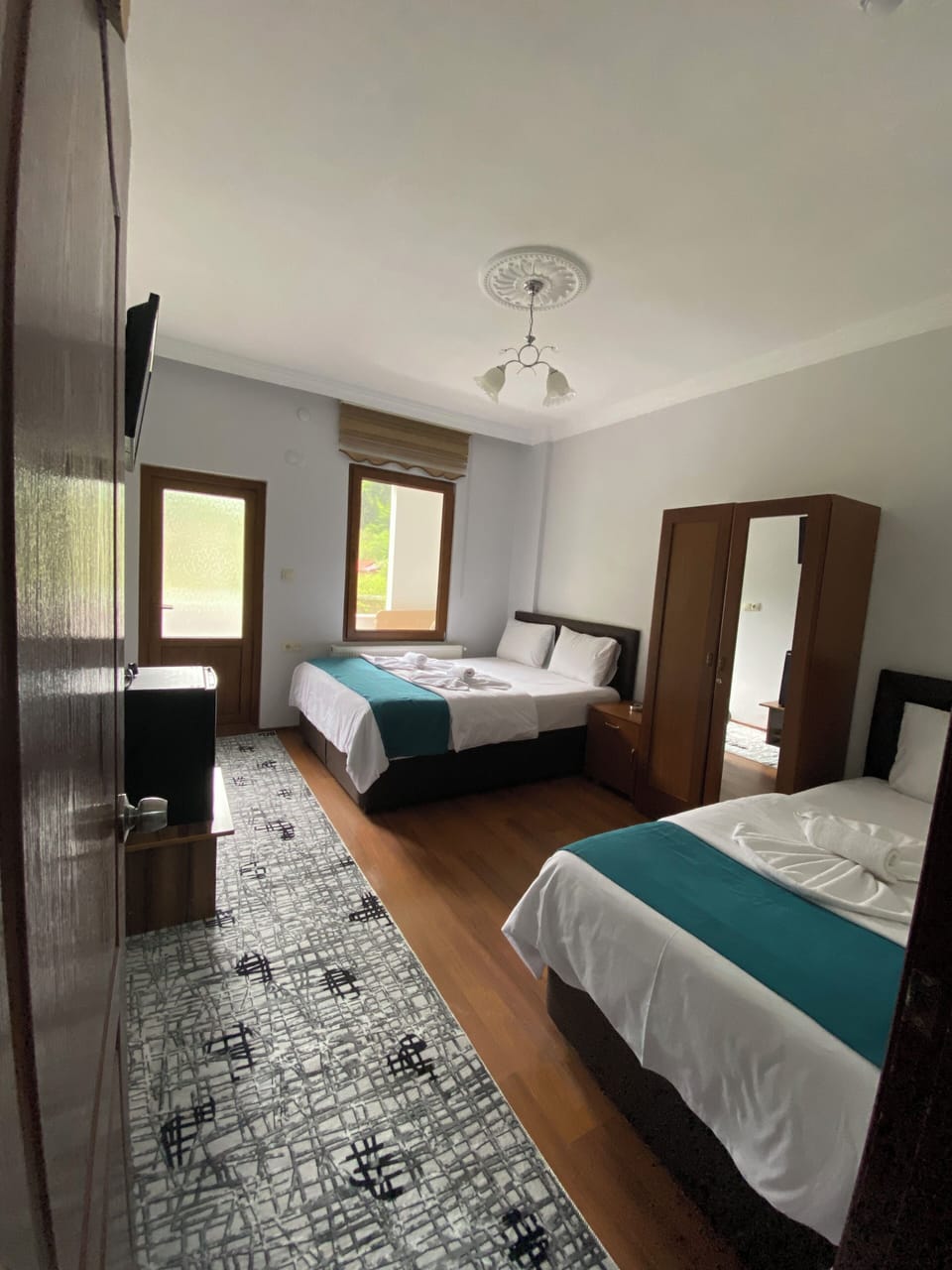 Standard Triple Room, Balcony, River View | In-room safe, free WiFi
