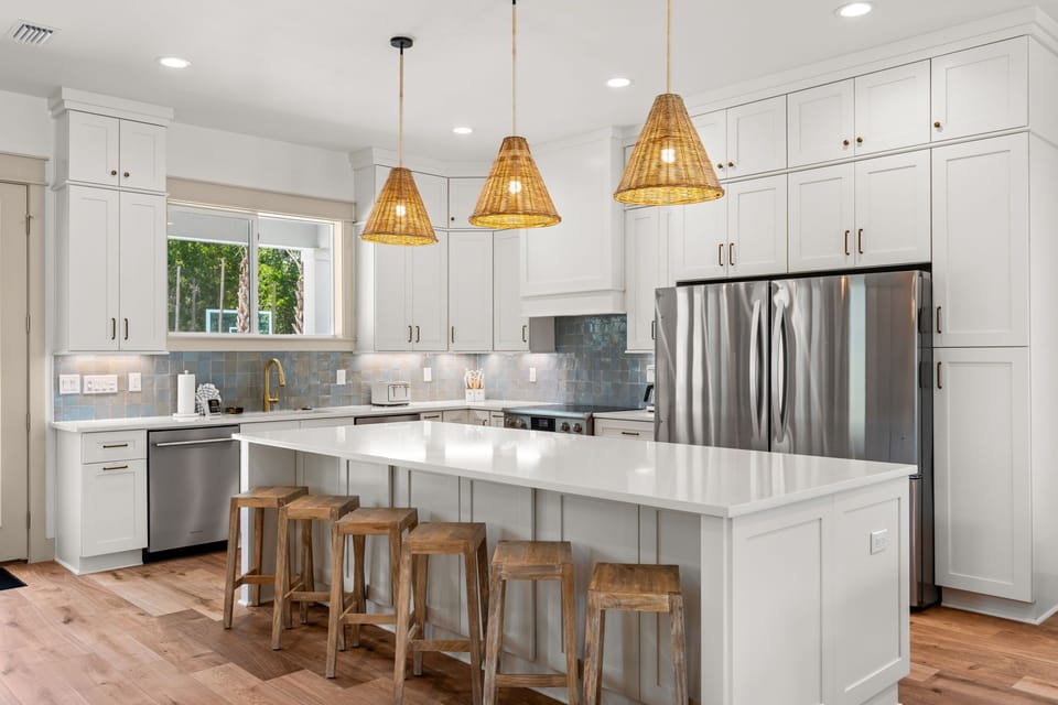 Spacious Kitchen With Island Bar and Modern Amenities On 1st Floor