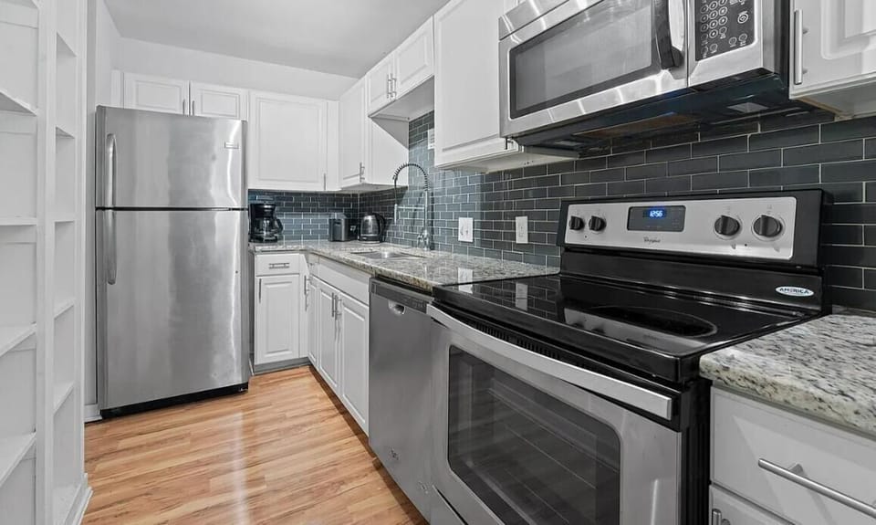 An inviting look at a modern remodel with ample counter space and updated fixtur