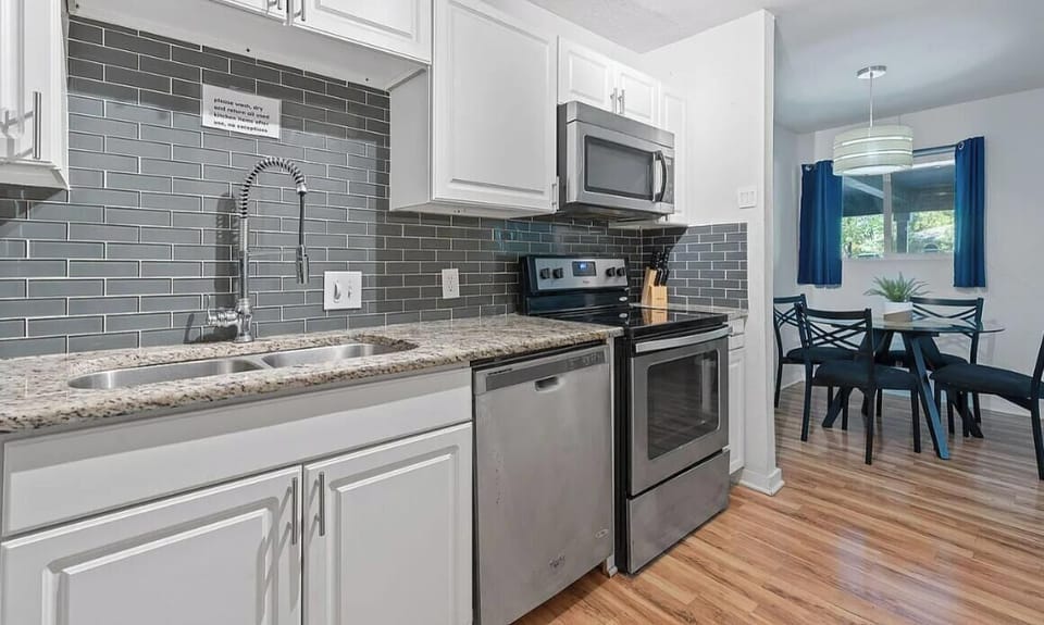 An inviting look at a well-appointed kitchen complete with an updated commercial