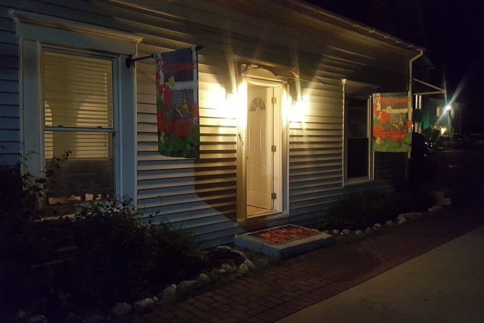 Outside of house at dusk.