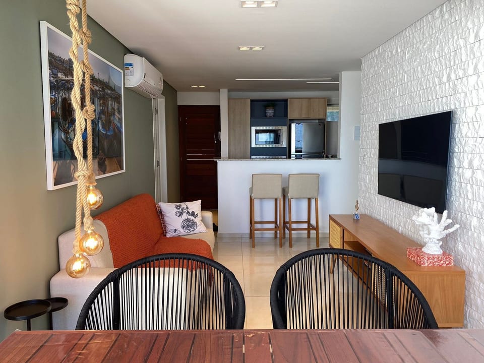 Premium Apartment | Living area | 42-inch Smart TV with cable channels