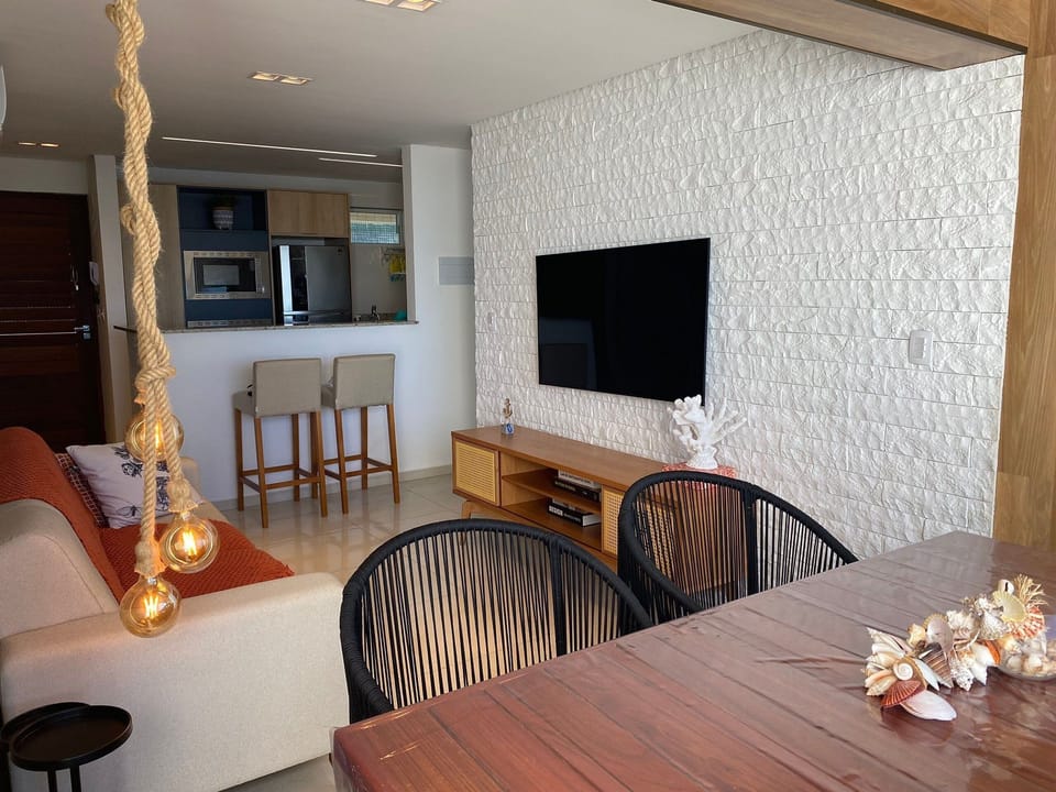 Premium Apartment | Living area | 42-inch Smart TV with cable channels