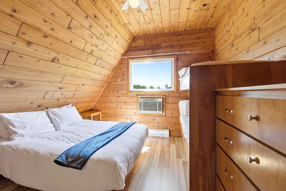 The kind of room where vacation stories are shared before lights out.