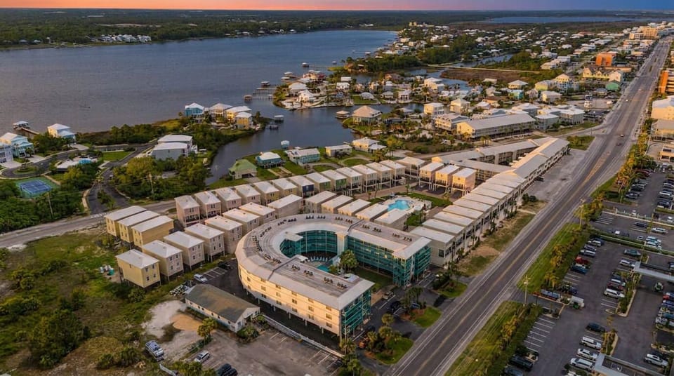 Waterfront condo community with pool and sweeping bay views