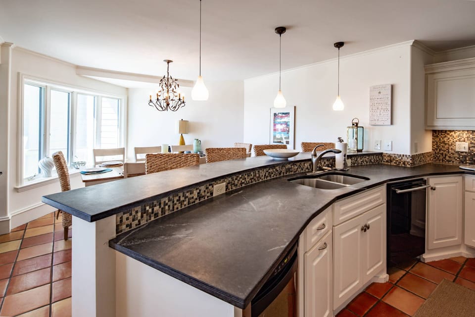 The spacious kitchen contains lots of room to prep your family's meals.