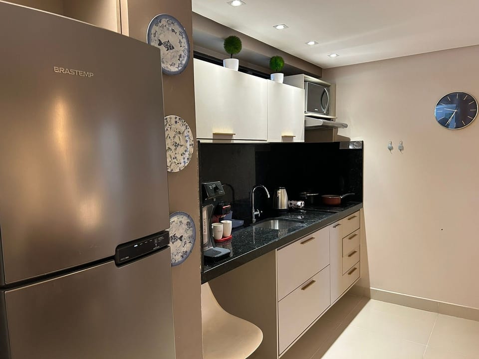 Family Studio, Multiple Beds, Refrigerator & Microwave, Pool View | Private kitchen