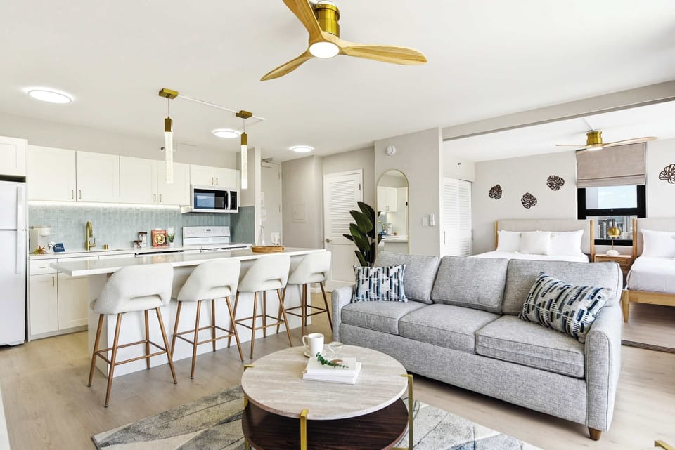 Relax in your living area with a sleeper sofa, breakfast bar with 4 chairs, and a fully equipped kitchen.