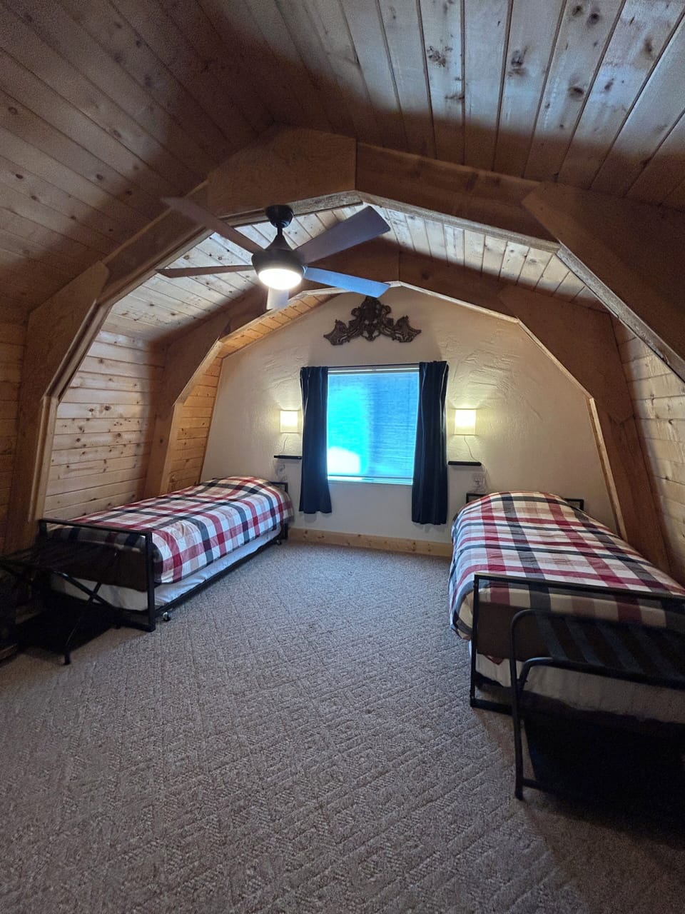 Upstairs loft with two twin trundle beds. 