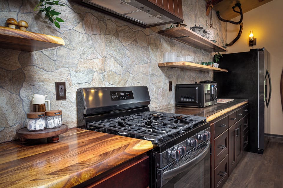 The kitchen is filled with cozy charm and whimsical storybook details.