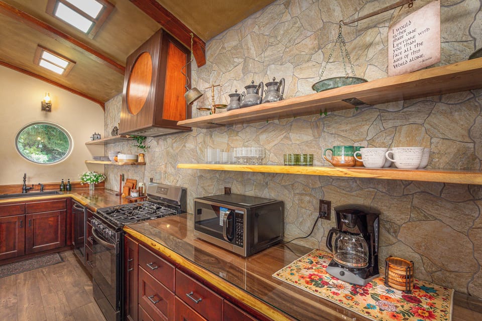 The kitchen is filled with cozy charm and whimsical storybook details.