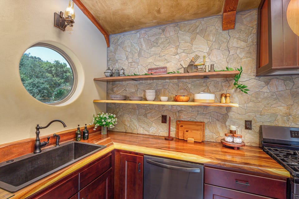 The kitchen is filled with cozy charm and whimsical storybook details.