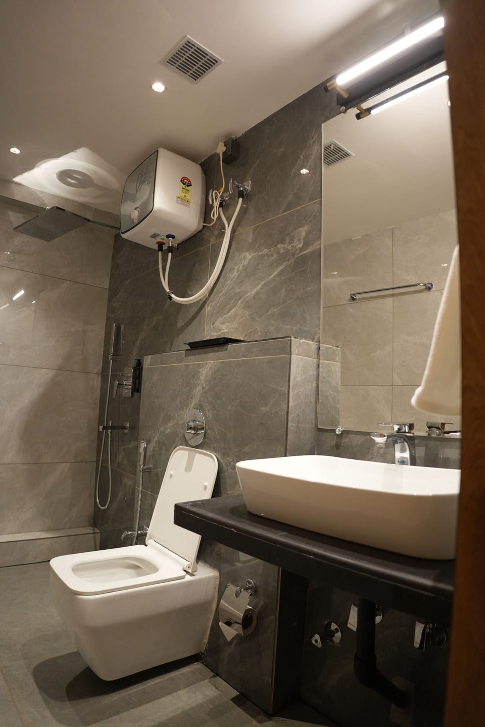 Shower, free toiletries, hair dryer, slippers