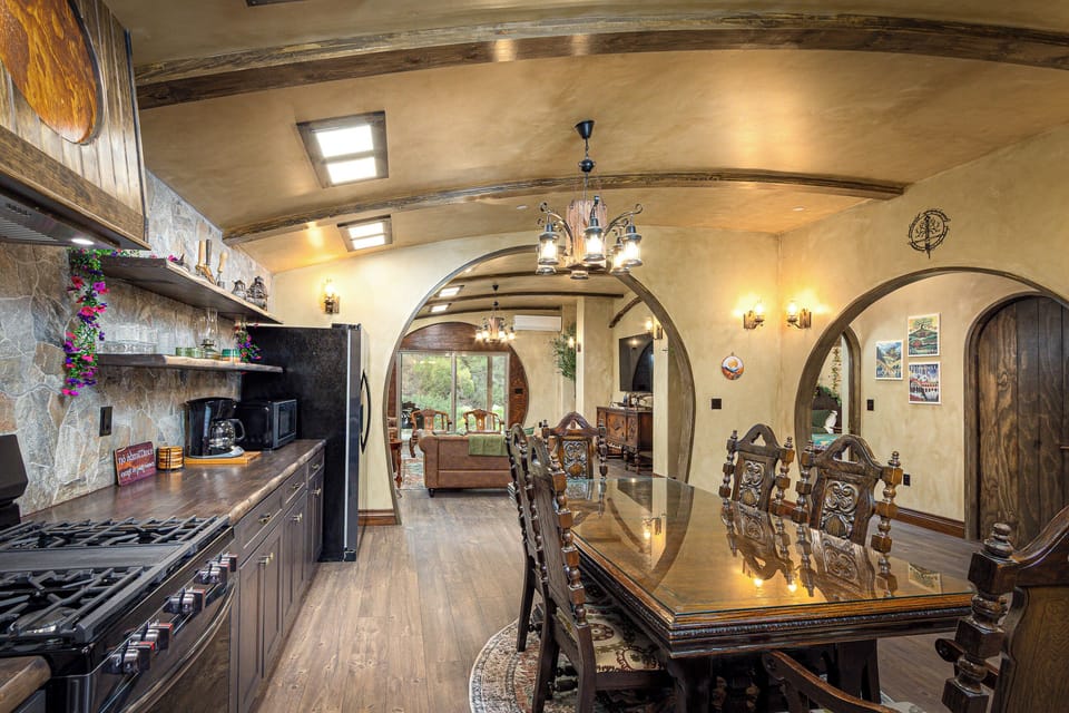 The kitchen is filled with cozy charm and whimsical storybook details. 