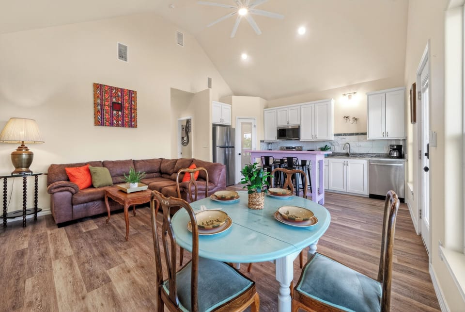 Dining nook with porch views, perfect for casual meals after a day by the bay.