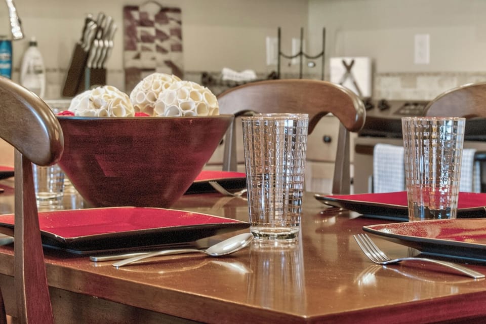 Fully stocked kitchen / dining area provides everything needed for family meals