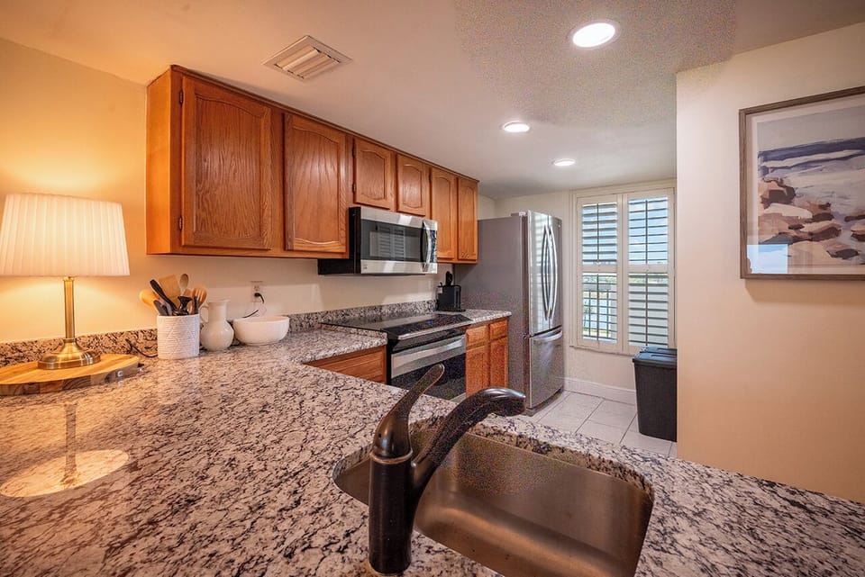 Fully Equipped Kitchen has all the appliances, dishware, cookware and tableware to entertain