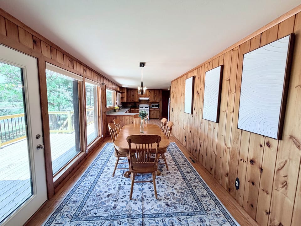Dining area with natural light and views