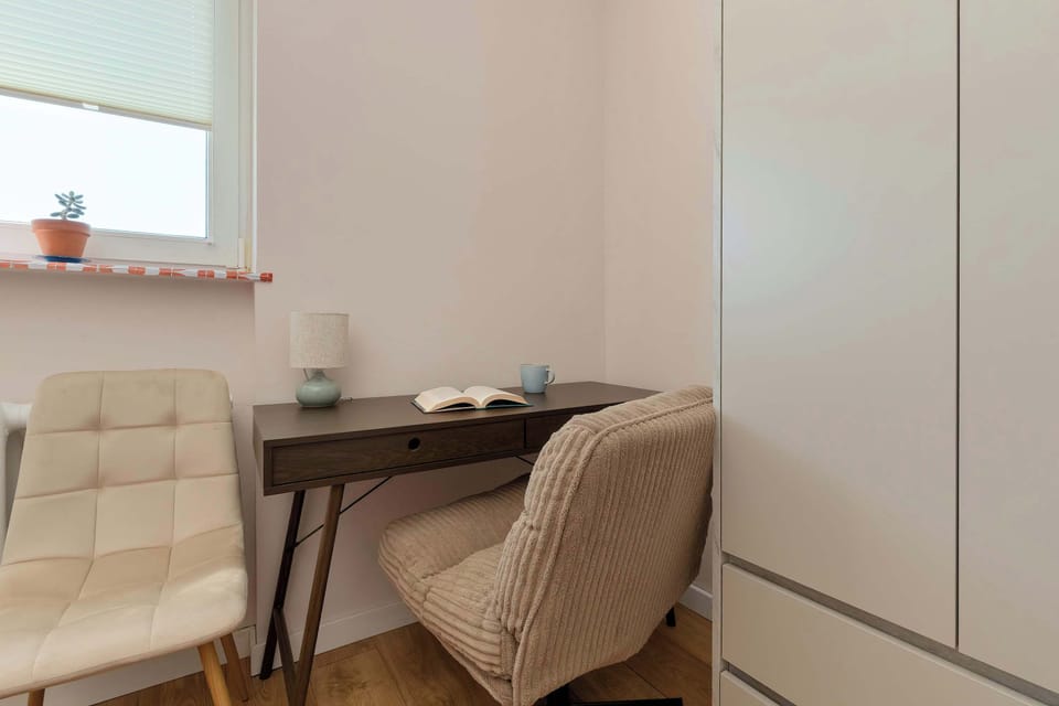 The bedroom's double bed ensures a restful night's sleep.