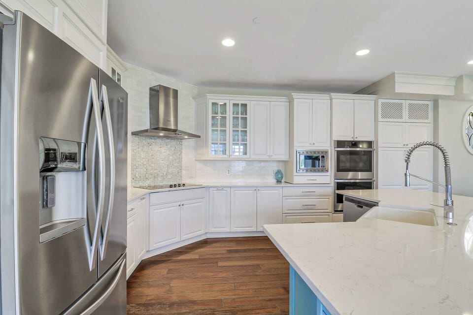 1 Collier Beach Road | Spacious kitchen w/ bar stool seating - 1 Collier Beach Road | Spacious kitchen w/ bar stool seating