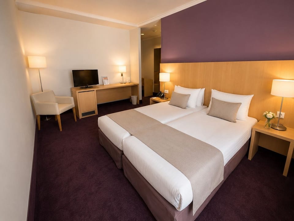 Junior Quadruple Room | In-room safe, desk, laptop workspace, free WiFi