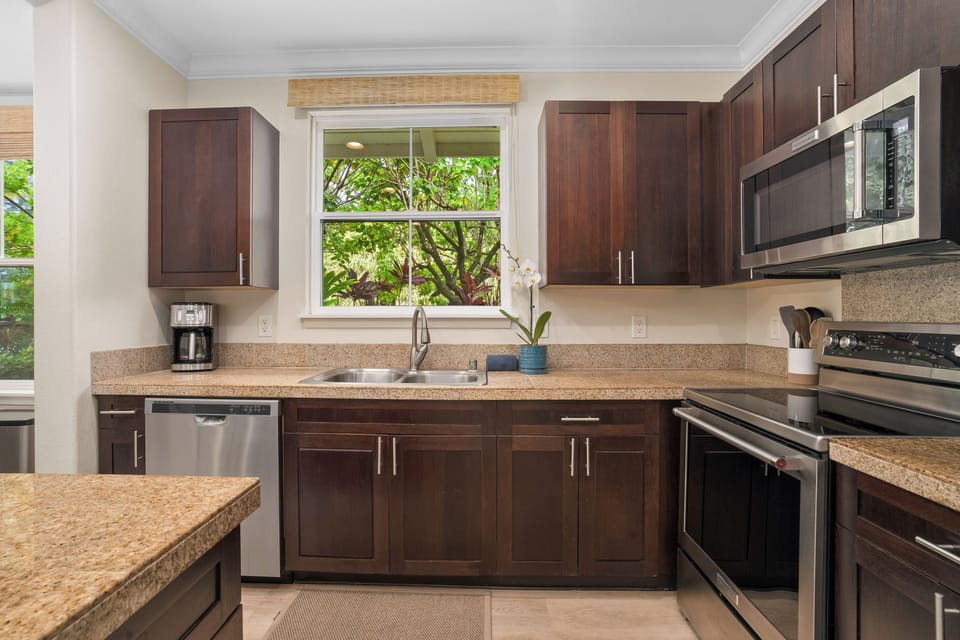 Prepare island-inspired meals in the fully equipped kitchen with ample counter space.