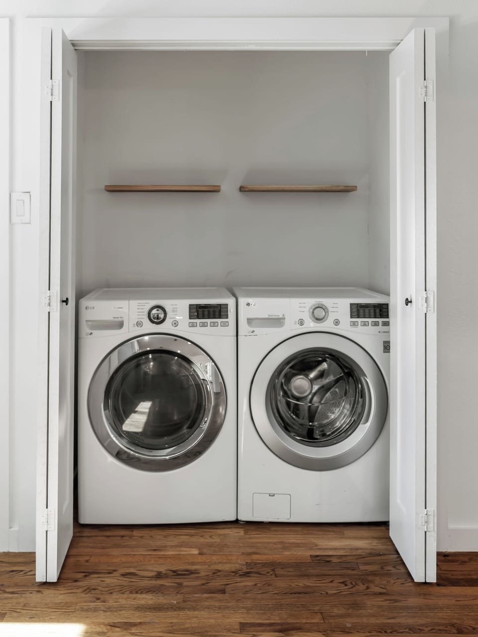 Your laundry stays fresh with this convenient in-unit washer and dryer tucked neatly behind closet doors.