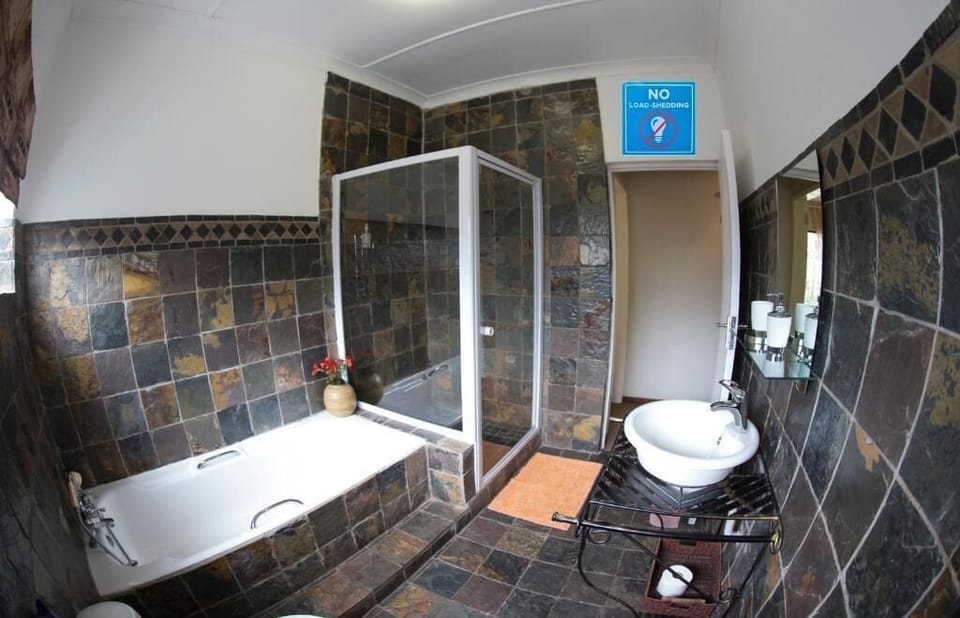 Family Triple Room, Patio, Garden View | Bathroom | Separate tub and shower, hair dryer, towels, soap