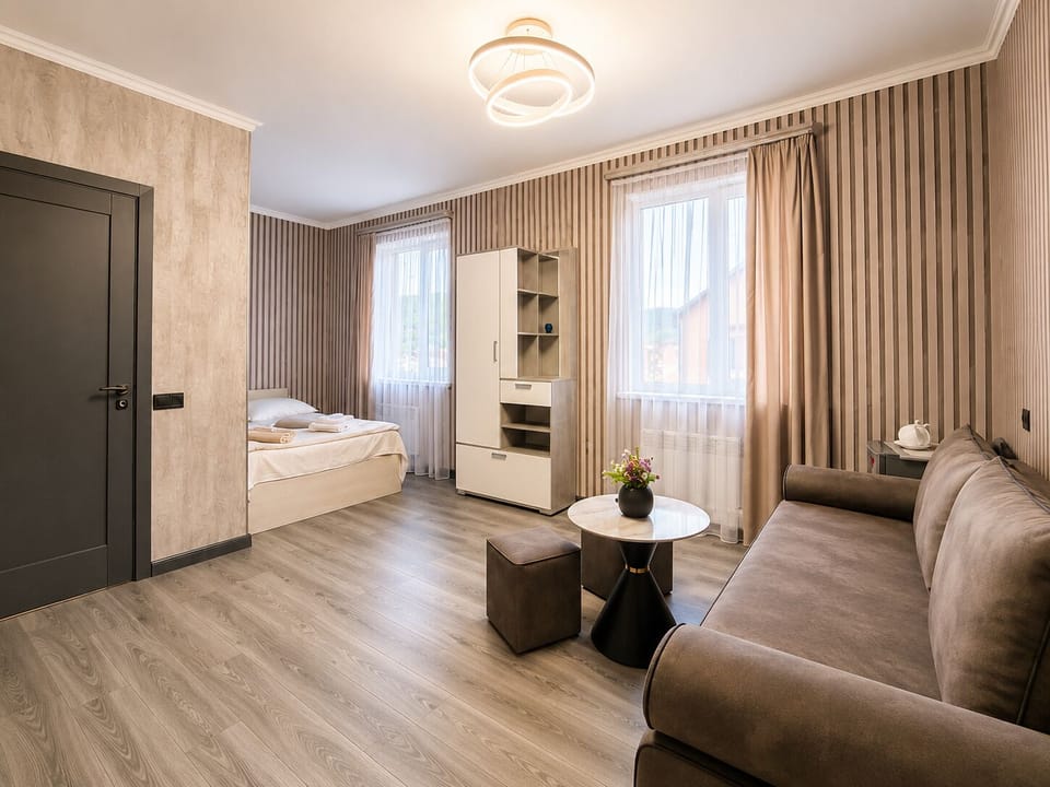 Deluxe Quadruple Room, 1 Queen Bed with Sofa bed, Mountain View | Iron/ironing board, WiFi (free)