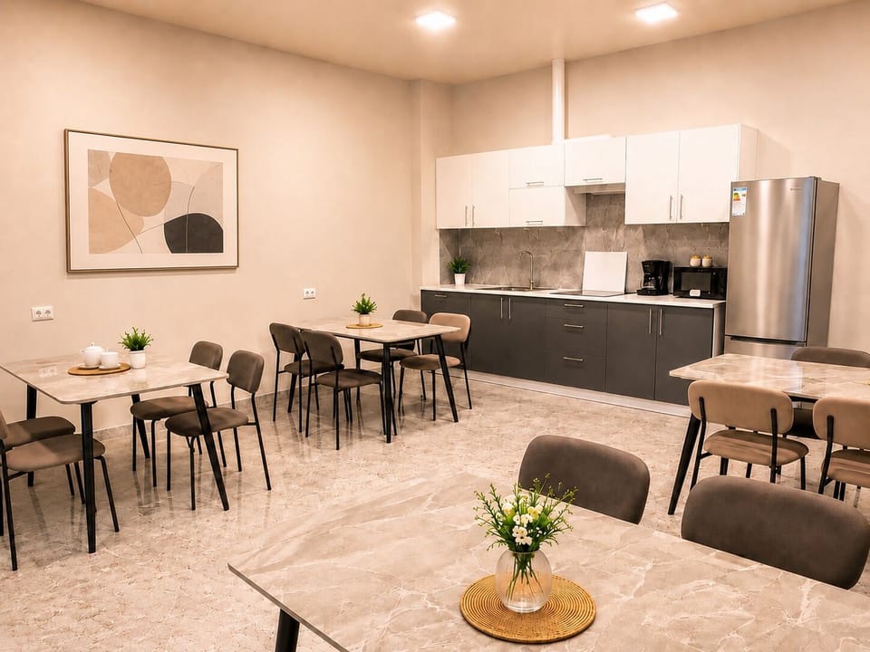 Deluxe Quadruple Room, 1 Queen Bed with Sofa bed, Mountain View | Shared kitchen | Full-size fridge, microwave, oven, stovetop