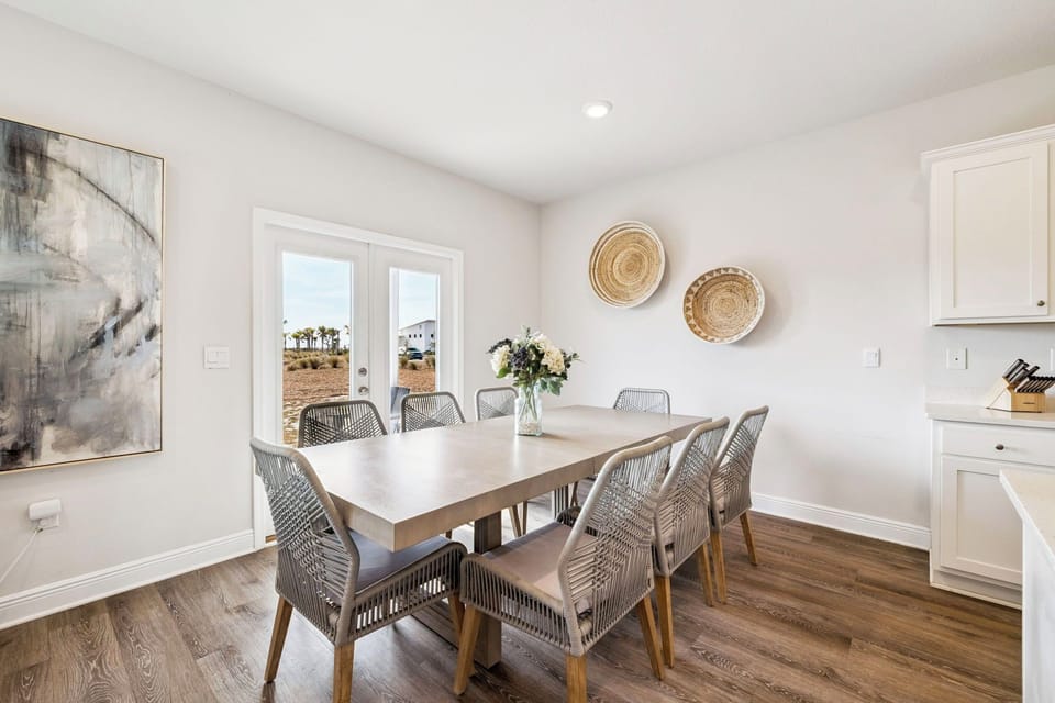 Gather around this elegant dining table where coastal charm meets modern comfort—perfect for memorable meals together.