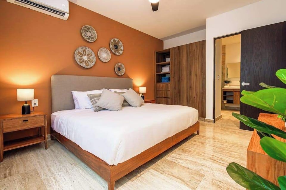 Master bedroom with a comfortable king bed