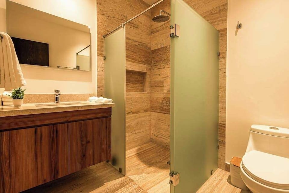 Full bathroom with vanity and amenities
