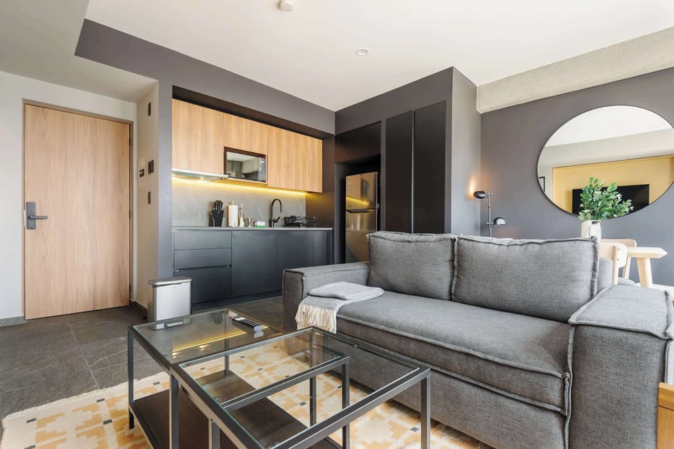 Comfortable sofa overlooking the dining area.
