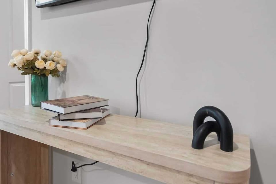 Functional desk space ideal for remote work or getting ready during your stay.