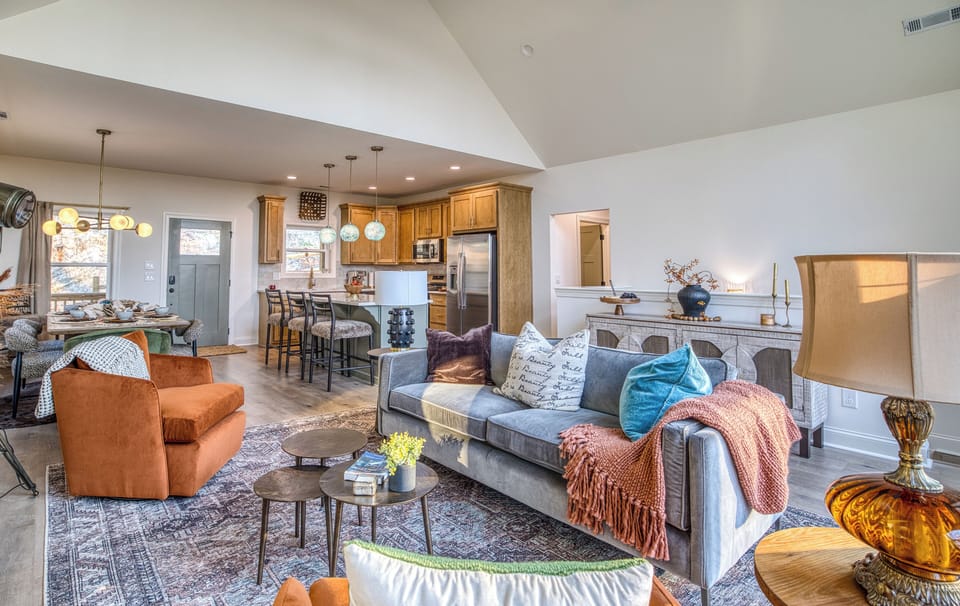 Open-concept living, kitchen, and dining area for easy gathering.