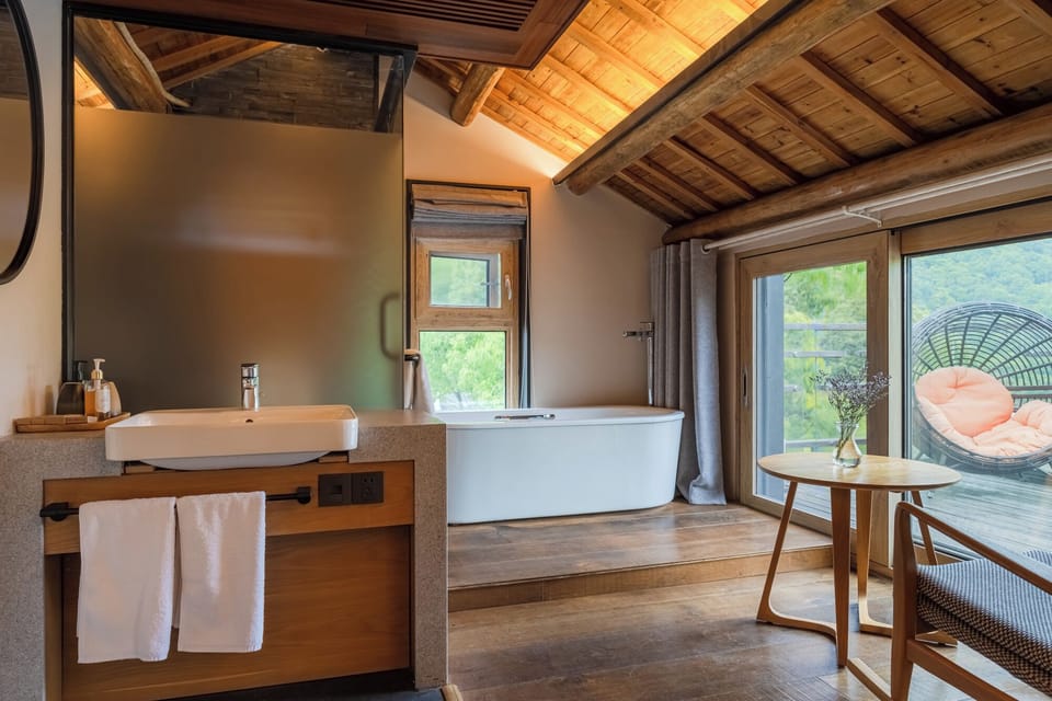 Premier Double Room, Balcony, Mountain View | Bathroom | Hair dryer, slippers, towels, soap