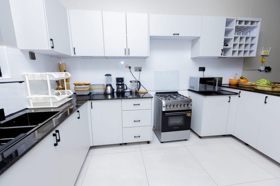 Comfort Apartment, City View | Private kitchen | Fridge