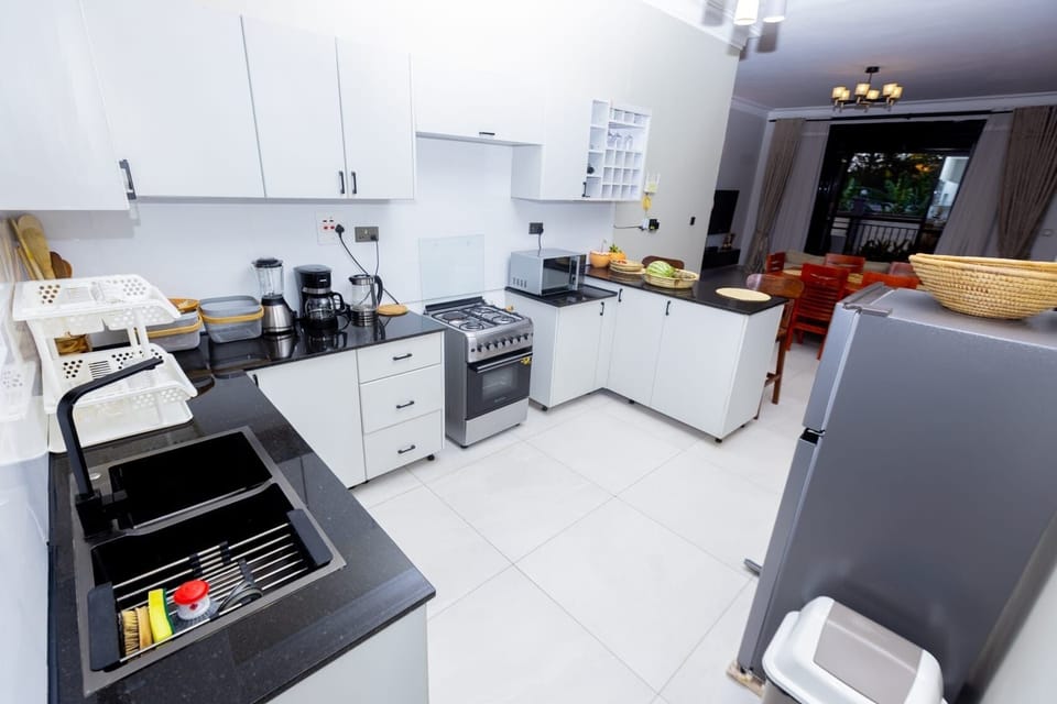 Comfort Apartment, City View | Private kitchen | Fridge