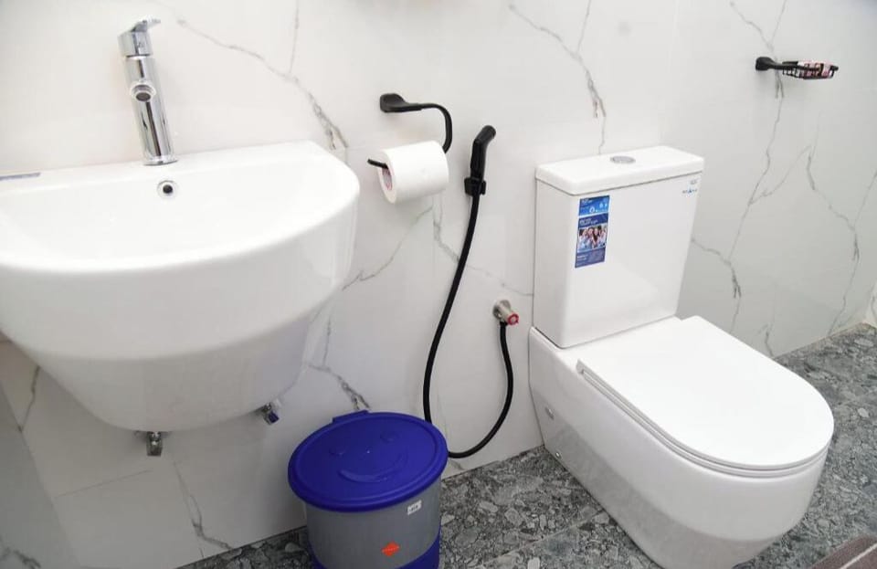 Shower, shampoo, toilet paper