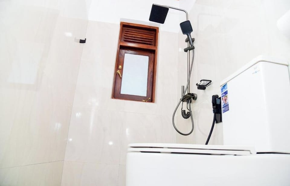 Shower, shampoo, toilet paper