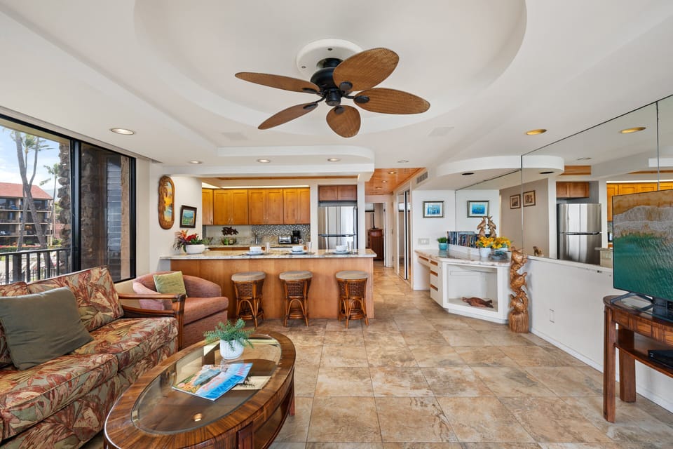 Spacious layout with cozy seating and a kitchen breakfast bar.
