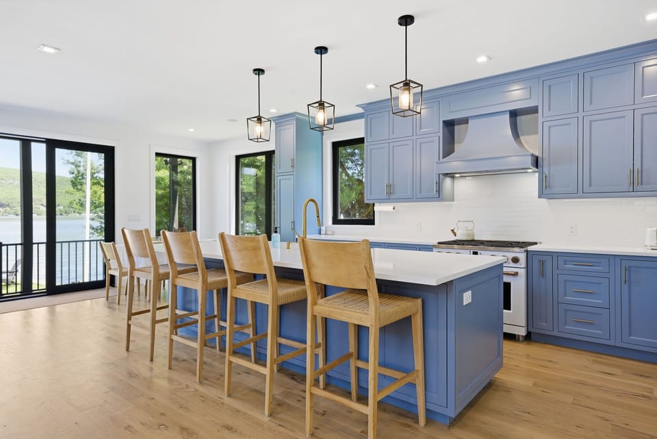 Spacious kitchen with oversized island seating and seamless open-concept flow.