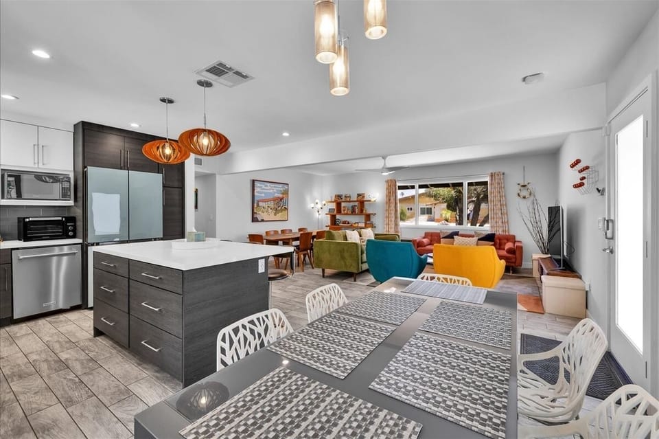 Open-concept kitchen, dining, and living space for group gatherings