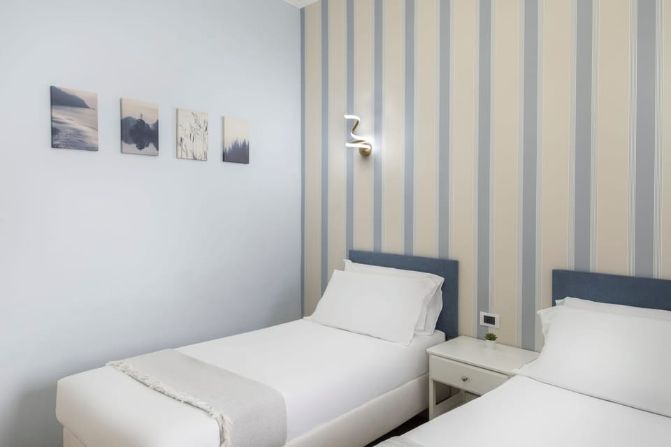 Standard Twin Room, Courtyard View | Iron/ironing board (on request), WiFi (free)