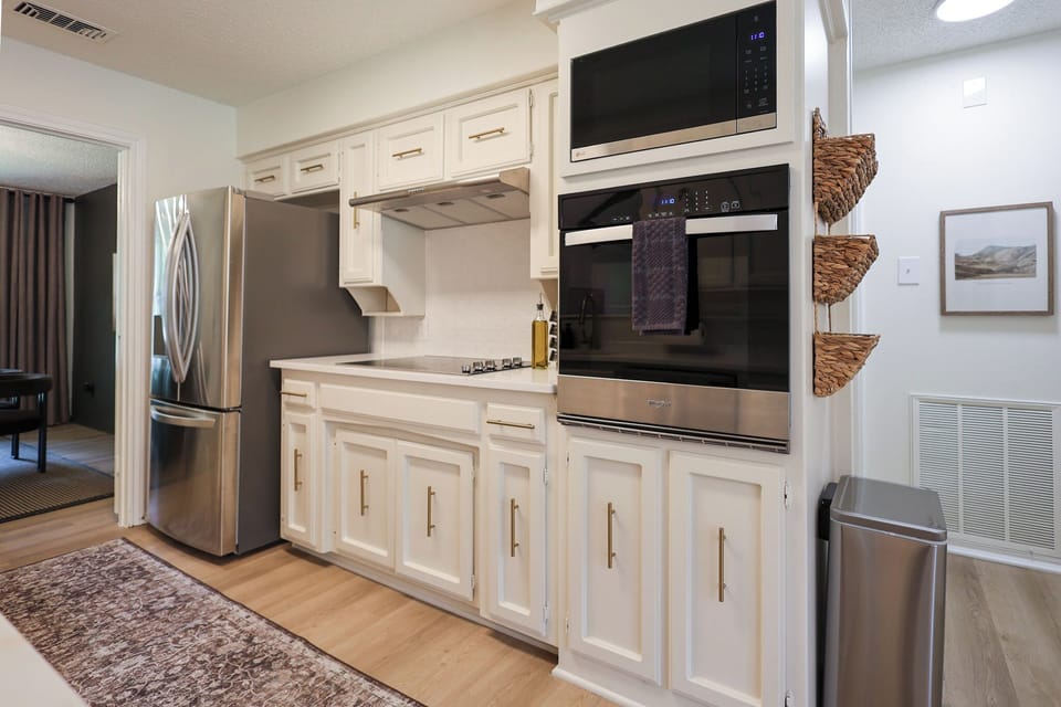 Alley Kitchen with gold finishes fully stocked.