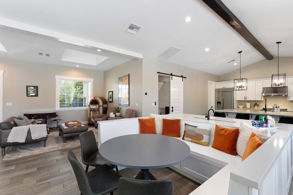 Bright, modern layout with seating for family dinners, games,or casual breakfast