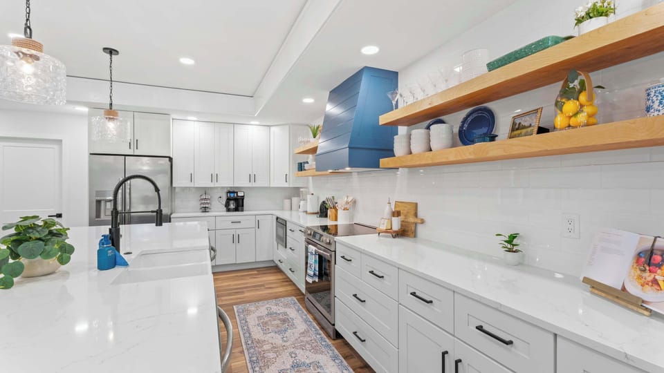 The fully updated kitchen features modern appliances, ample counter space, and all the comforts of home.